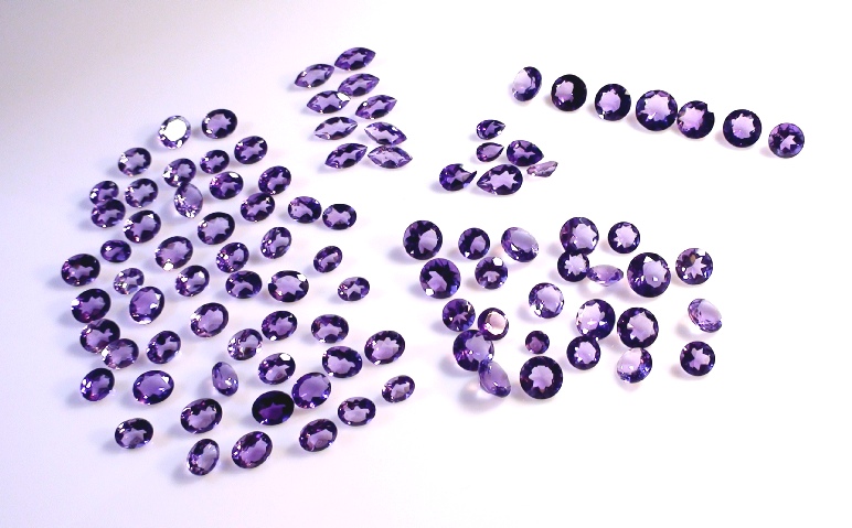 Amethyst Faceted Gemstone Lot of 200 carets on Display